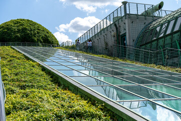 Botanical garden on the roof. Library of Warsaw University. Polish modern architecture. Green plants in summer
