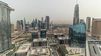 Pnorama showing futuristic Dubai Downtown and finansial district skyline aerial timelapse.