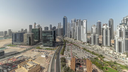 Panorama showing Bay Avenue with modern towers residential development in Business Bay aerial timelapse, Dubai
