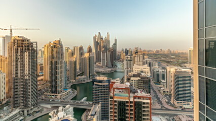 Panorama showing various skyscrapers in tallest recidential block in Dubai Marina aerial timelapse