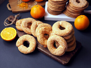 Traditional spanish pastries - Shortbread rings with orange zest and an orange
