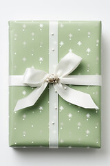 Vintage snowflake-patterned Christmas wrapping paper neatly folded isolated on a snow-white gradient background 