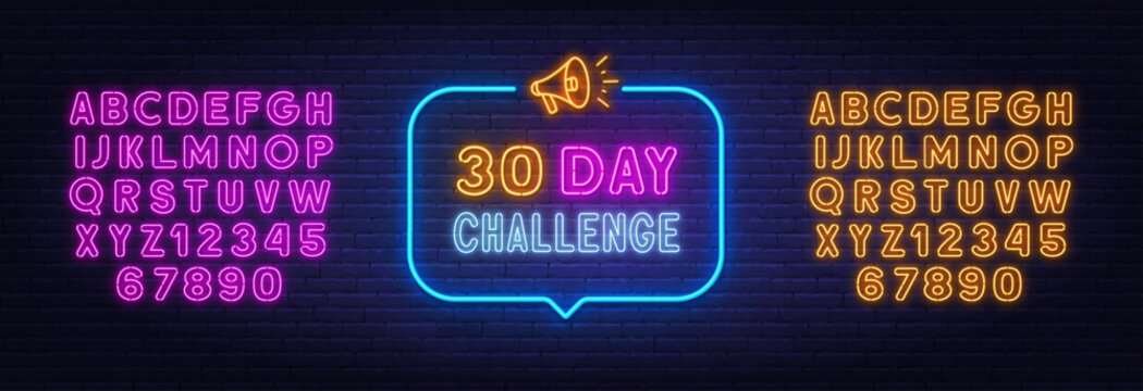 30 day challenge neon sign in the speech bubble on brick wall background.