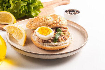 Delicious tuna open sandwiches. Buns with canned tuna, lemon, cream cheese and boiled egg.