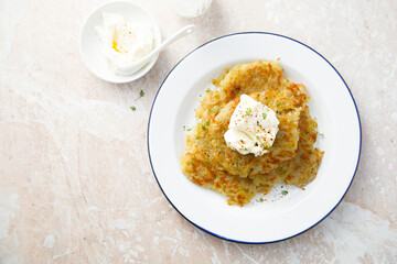 Homemade potato latkes with cream cheese