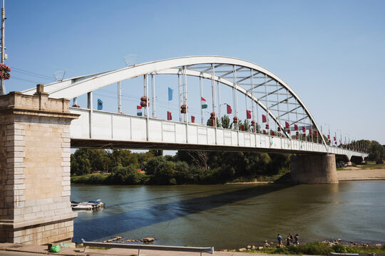 Famous historic Belvarosi bridge across Tisza river in Szeged Hungary. Translation from Hungarian - Belvarosi Bridge