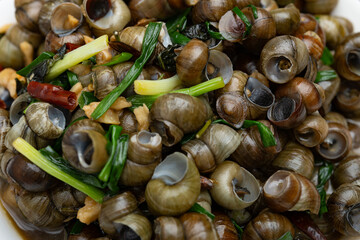 top view home cooked dish of field snail