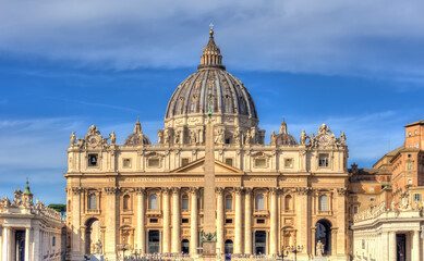 Fototapeta na wymiar St. Peter's basilica on St. Peter's square in Vatican, center of Rome, Italy
