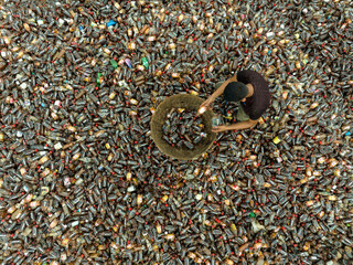 Dhaka, Bangladesh - 11 June 2023: Aerial view of a people working in a plastic Waste treatment plant, Tangail, Bangladesh.