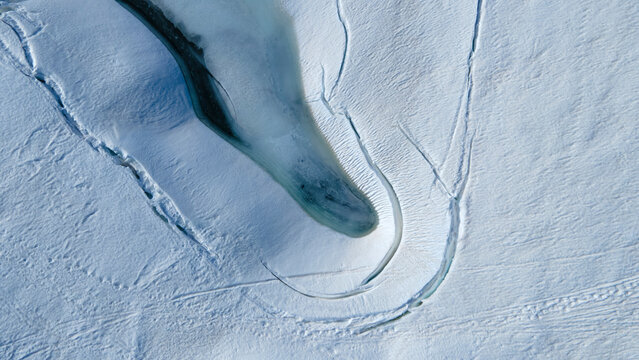 Aerial view of snowy landscape in Grindelwald, Switzerland.