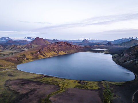 Aerial view of Alftavatn Lake at twilight among the mountains in the highlands of Iceland, Hella, Southern Region, Iceland.
