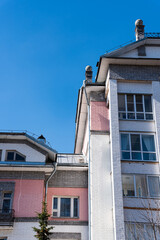 Fototapeta na wymiar Modern residential multi-storey building against the blue sky.