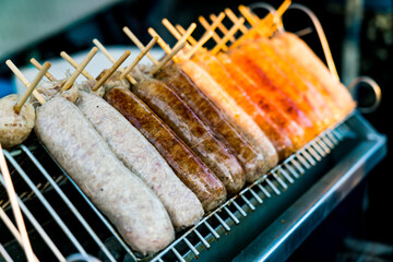 Pork sausage grilled in a hot oven, looking delicious.
