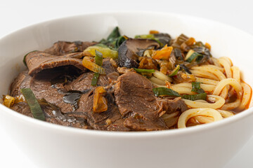 Taiwanese beef noodle on white background