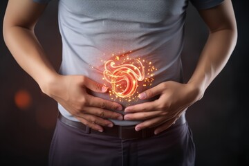 "Acid reflux or heartburn. Photo of the stomach on the male body against a gray background,