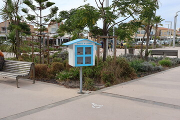 A picture of one of the many book boxes scattered around valras plage in france. 