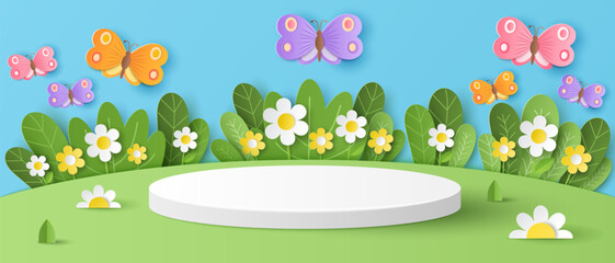 Paper cut of field of flowers and flocks of butterfly on blue sky background with white cylinder podium for your products display presentation.