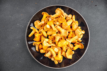 chanterelles fresh mushrooms delicious mushroom appetizer meal food snack on the table copy space food background rustic top view keto or paleo diet vegetarian vegan food
