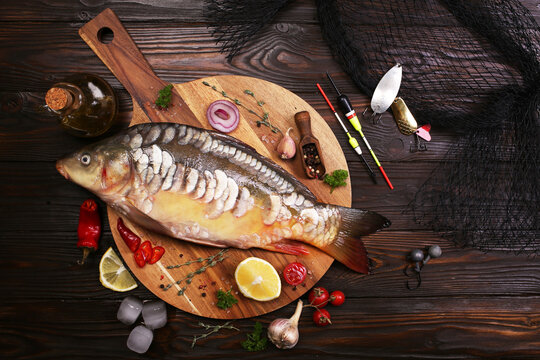 Carp fish with spices and vegetables