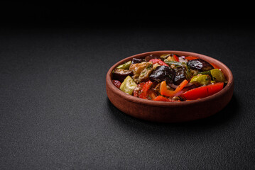 Delicious fresh salad of grilled vegetables peppers, tomatoes, eggplants and zucchini