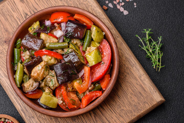 Delicious fresh salad of grilled vegetables peppers, tomatoes, eggplants and zucchini