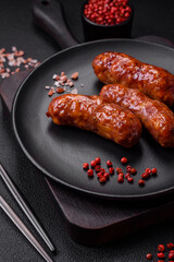 Delicious grilled chicken or pork sausages with salt, spices and herbs