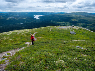 hiking on top of hill near lillehammer in norway