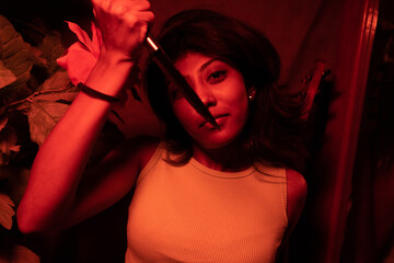 a glorious brown south asian woman with multiple poses pictures,low light, multiple colour,multiracial,psycho killer,knife - obrazy, fototapety, plakaty