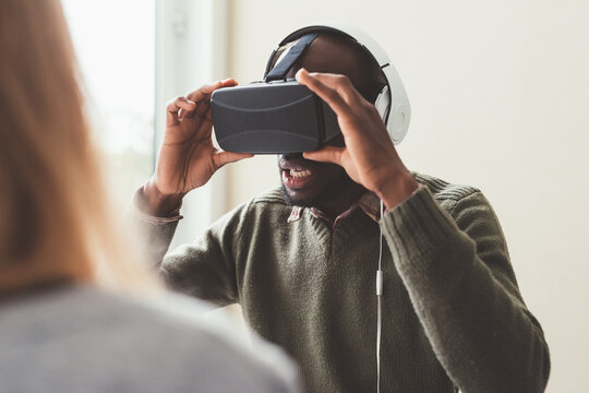 Black man indoor using 3d viewer