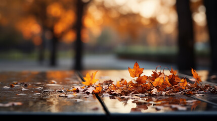 wooden table at a park in autumn with autumn leaves, blurry bokeh background, product display, copy space, banner