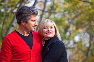 Husband And Wife Together In A Park In Autumn; St. Albert, Alberta, Canada