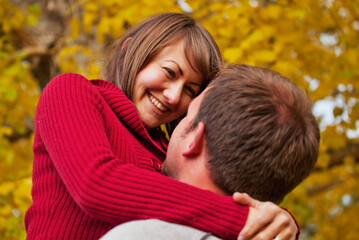 Husband And Wife Together In A Park In Autumn; Edmonton, Alberta, Canada