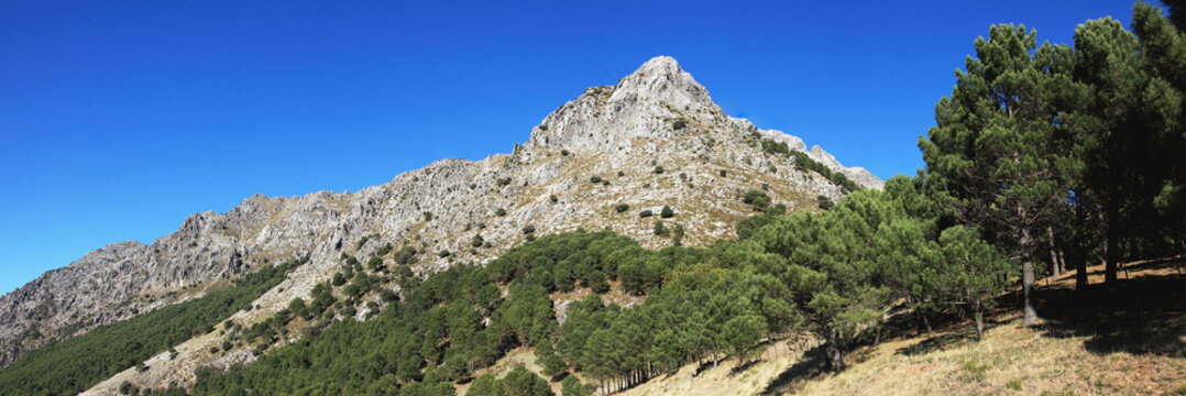 Landscape With A Peak In The Mountain Range Sierra Del Pinar Against A Blue Sky; Andalusia, Spain