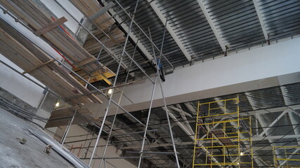 Fototapeta premium Construction of a large building. The premises of the concert hall during construction.