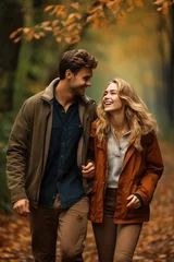 Papier Peint photo Brugges a beautiful young caucasian couple posing for a selfie photo on a forest walk on a vacation in autumn