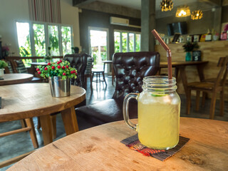 lemon soda on a wooden bar in coffee shop