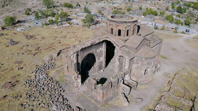 Tilt up aerial shot of Talin Cathedral on sunny summer day. Talin, Armenia.