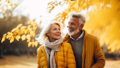 Middle aged couple on a walk in autumn park