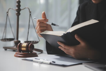 female lawyers working at the law firms. Judge gavel with scales of justice. Legal law, lawyer,...