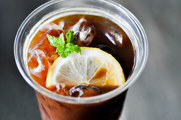 lemon tea ,honey tea , peach tea or mango tea or fruit tea in plastic glass