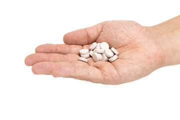 Round therapeutic pills or drugs for treatment in male hand palm isolated on transparent background, medicine and healthcare concept, close-up view