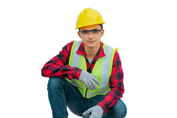 Engineer wearing a yellow hat Sitting looking at the camera and smiling on a white screen