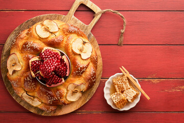Jewish Holidays - Rosh Hashanah or Rosh Hashana. Pomegranate, apples, honey and round challah on ...