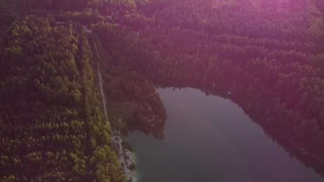 forest lake at sunset top view 60 fps