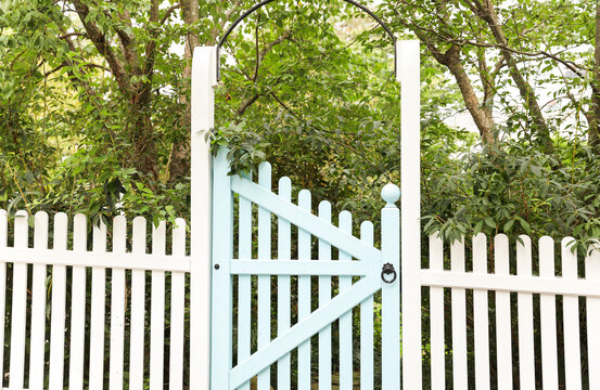 Rustic fence gate at home entrance, symbolizing security, privacy, and welcoming charm