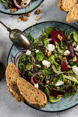 Fresh green salad, ruccola, different lettuce, cottage cheese or ,feta cheese, beetroot and seasoning with wholegrain bread - 647766198