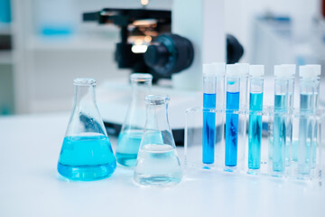 Laboratory glassware and scientific backgrounds, extensive research in science medicine, biology and biotechnology chemistry and scientific exploration. Liquid samples analyzed in test tubes