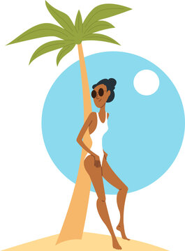 A girl in a swimsuit stands near a palm tree. Beach leisure scene.