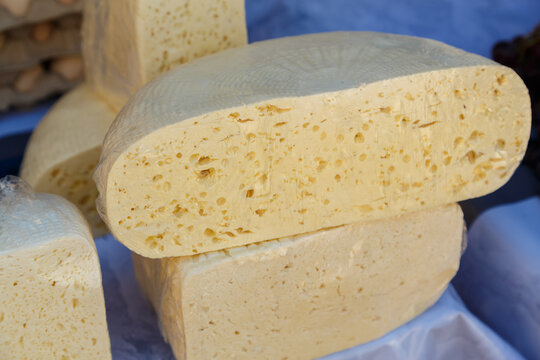 Dagestan homemade salty white cheese fresh in round shapes.
