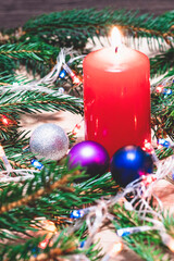 spruce branches, candle,christmas background